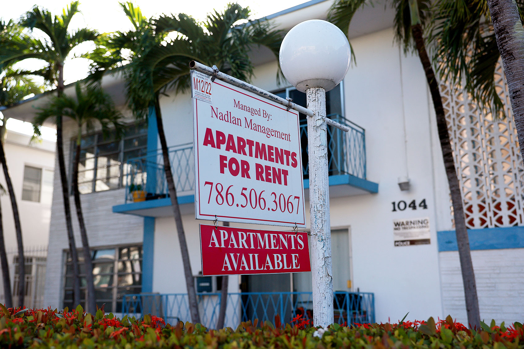 An 'Apartments for Rent' sign hangs in front of a building on December 06, 2022 in Miami Beach, Florida. (Joe Raedle/Getty Images)