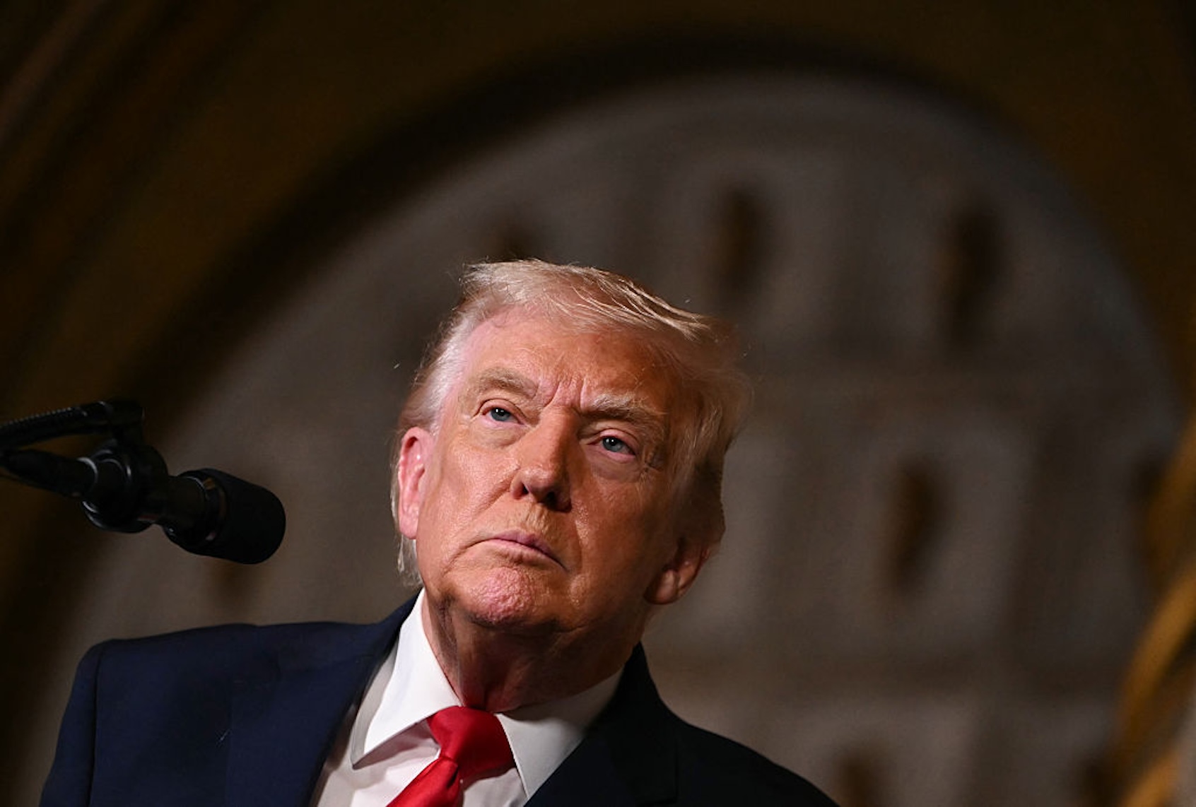 Donald Trump takes questions at Mar-a-Lago on Dec. 22, 2025. (ANDREW CABALLERO-REYNOLDS / AFP via Getty Images)