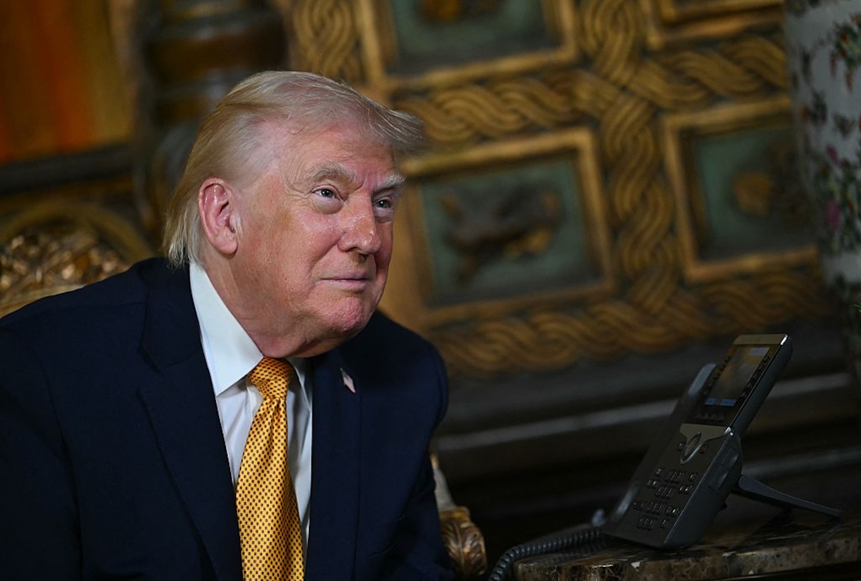 President Donald Trump on Christmas Eve at Mar-a-Lago. (ANDREW CABALLERO-REYNOLDS / AFP via Getty Images)