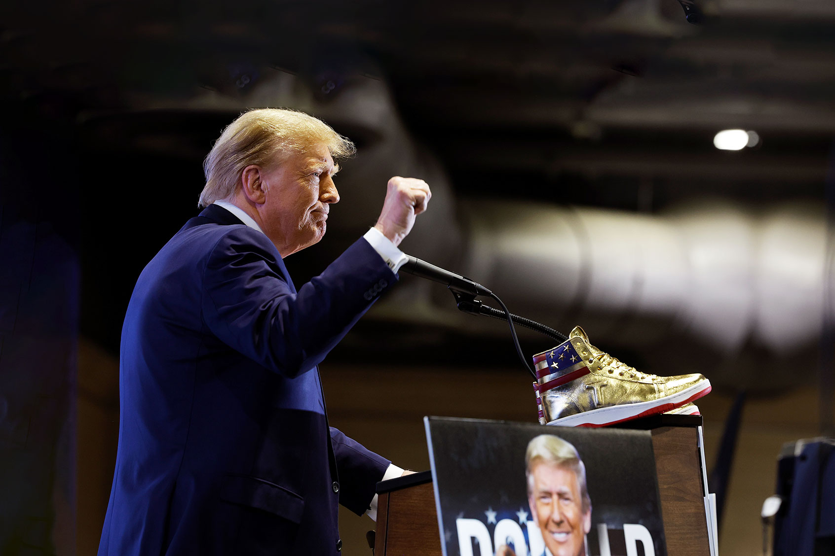 Republican presidential candidate and former President Donald Trump takes the stage to introduce a new line of signature shoes at Sneaker Con at the Philadelphia Convention Center on February 17, 2024 in Philadelphia, Pennsylvania. (Chip Somodevilla/Getty Images)