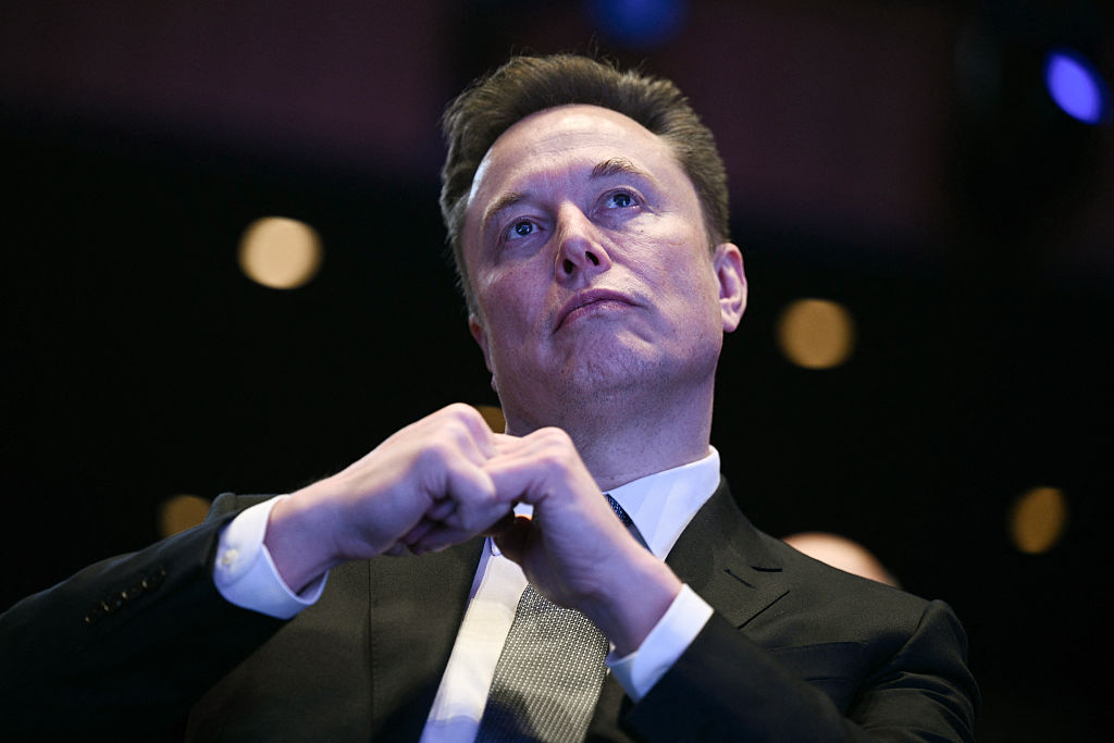 Elon Musk envisioned a future with optional work and irrelevant money thanks to the domination of artificial intelligence. (BRENDAN SMIALOWSKI / AFP via Getty Images)