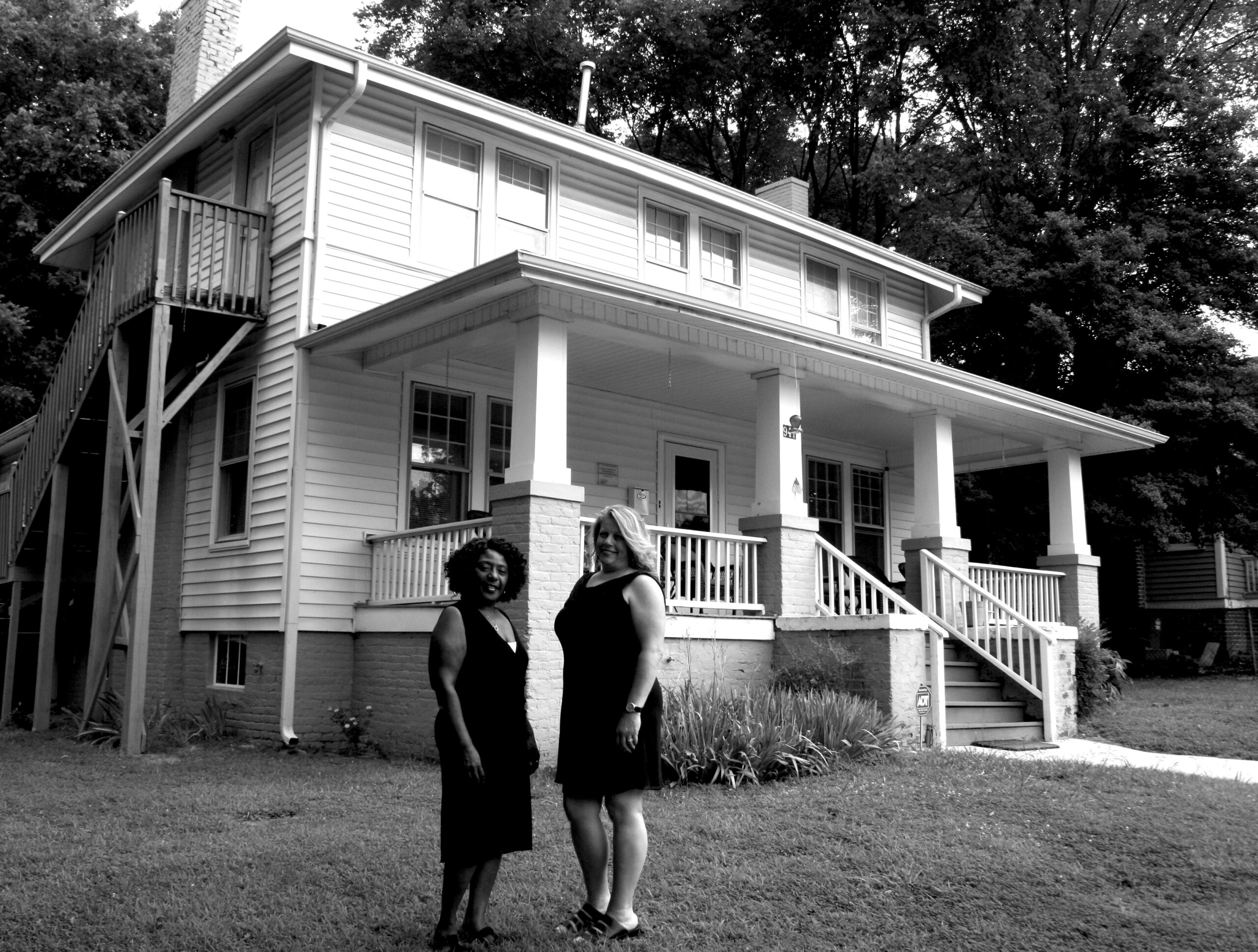 Kristin O'Leary, Vice President and Denita Mitchell, Program Manager of Hawley House, stand outside the doors that once welcomed them in. (John Higgins)