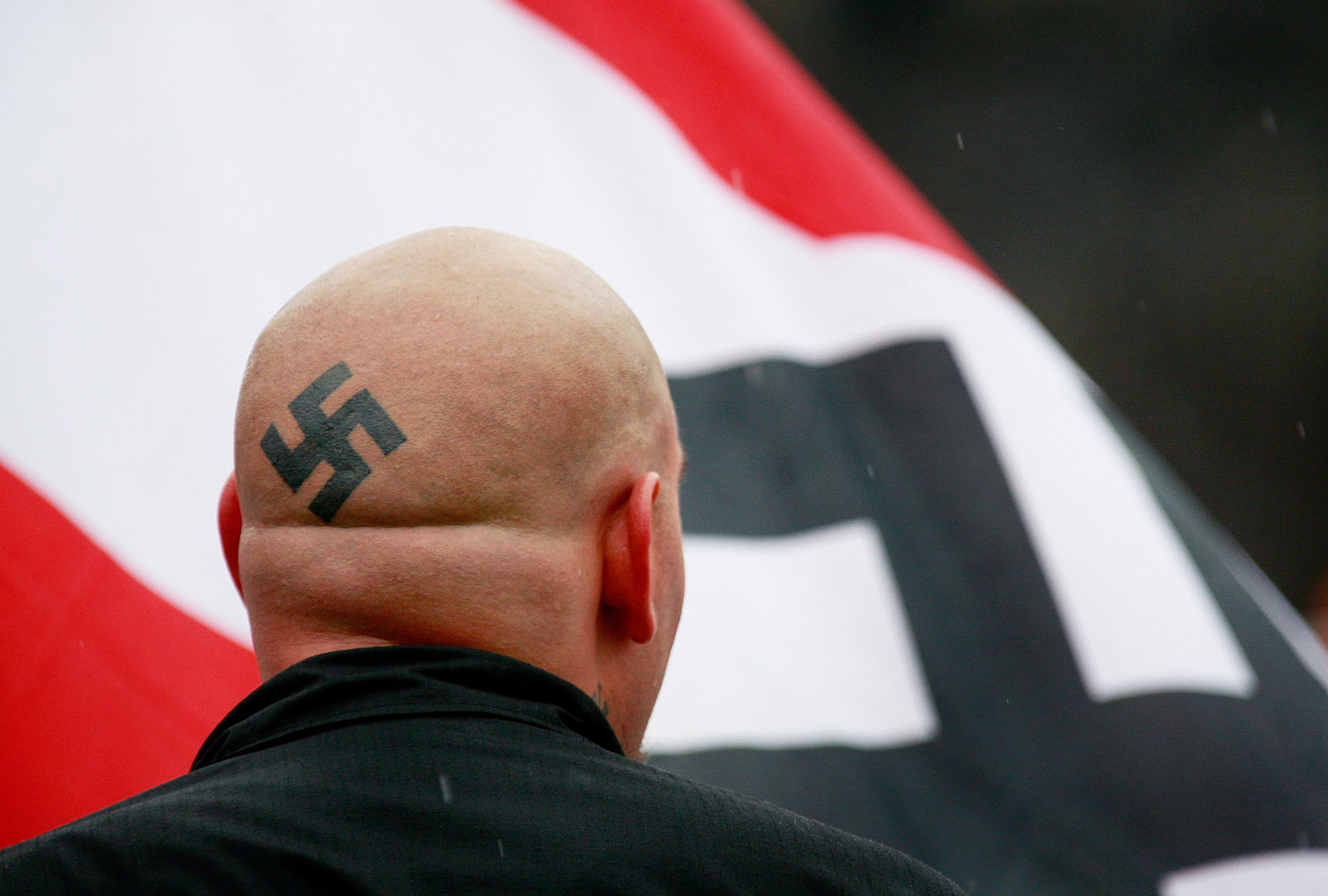 Neo-Nazi protestors organized by the National Socialist Movement demonstrate near where the grand opening ceremonies were held for the Illinois Holocaust Museum & Education Center April 19, 2009 in Skokie, Illinois. (Scott Olson/Getty Images)