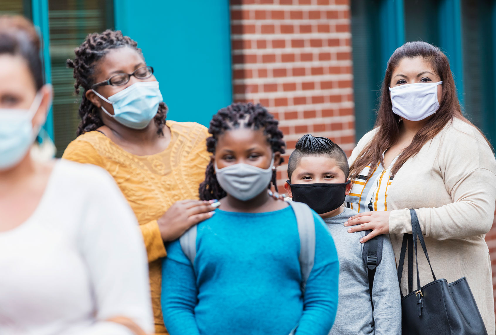 Mothers with children, back to school during covid-19 (Getty Images)