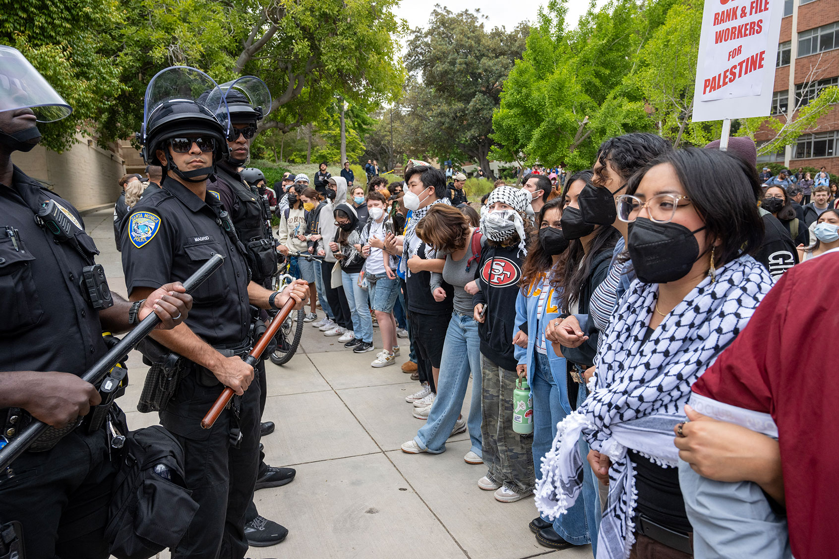 Pro Palestinian protesters stand off with police during a rally on the campus of UCLA in Los Angeles on Thursday, May 23, 2024. (Hans Gutknecht/MediaNews Group/Los Angeles Daily News via Getty Images)