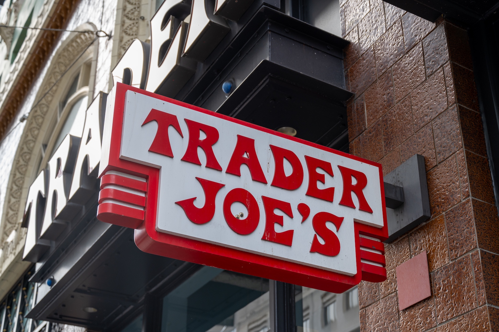Close-up of Trader Joe's grocery store sign on building facade (Smith Collection/Gado/Getty Images)